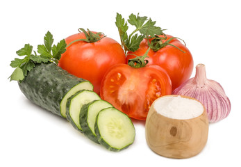 Tomatoes and cucumber isolated on white background