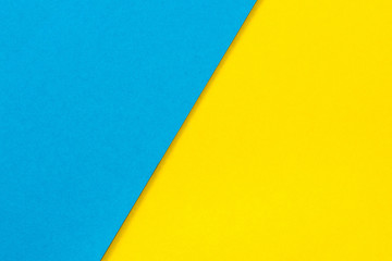 Blue and yellow color corrugated cardboard texture background. Trend colors, geometric cardboard paper background.