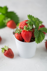 Fresh juicy strawberries with leaves. Strawberry background. Healthy food concept. Fresh organic berries
