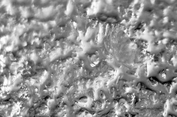 multi-colored paint on uneven surface