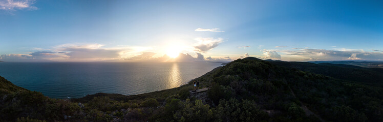 Sunset on sea and mountains