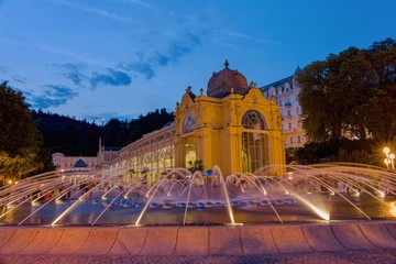 Main colonnade and singing fountain at night - center of Marianske Lazne (Marienbad) - great famous...