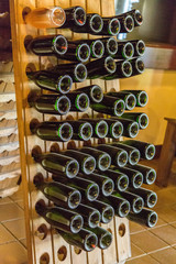 Champagne Riddling Rack Full of Wine Bottles at a Winery