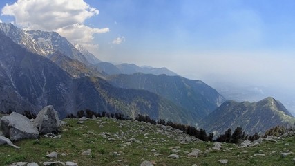 green mountain valley with snowy peaks