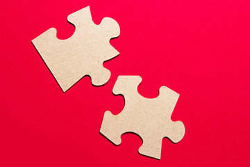 Two puzzles on a red background.