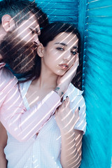 Feeling protected in his hands. Bearded man hug arabian woman. Passion and desire. Sensual couple in love. Enjoy closeness and love