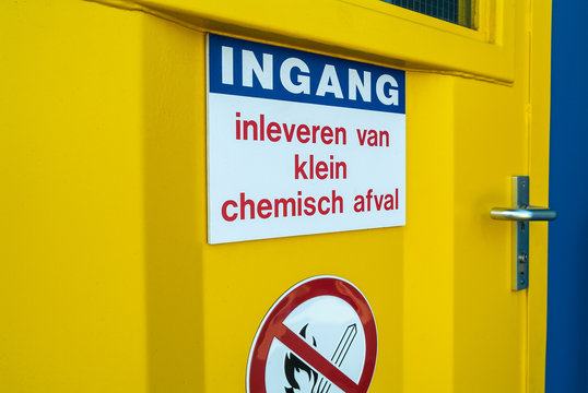 Entrance of a Dutch civic amenity with the text 'small chemical waste collection'