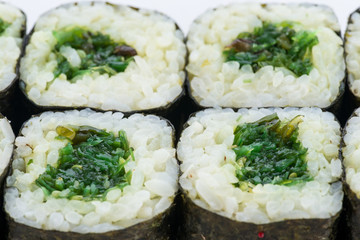 Sushi set and composition at white background. Japanese food restaurant, sushi maki gunkan roll plate or platter set.
