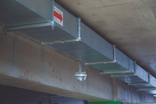 Fire exhauster in a multi-level parking building