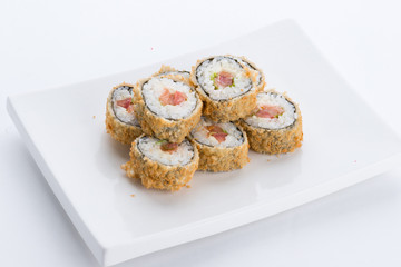 Sushi set and composition at white background. Japanese food restaurant, sushi maki gunkan roll plate or platter set.