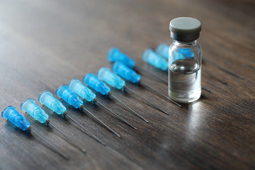 Ampoule and needles from a medical syringe