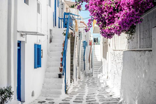 Narrow street with white houses, Greece