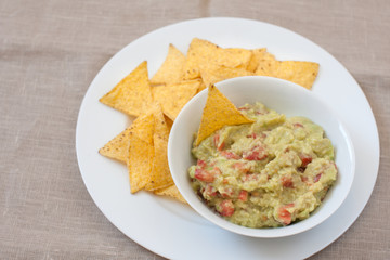 fresh mexican guacamole and tortilla chips