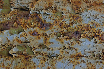 Old Painted Metal Background. Abstract Rusted  Metal Background.Cracked Paint On Rusted Metal.