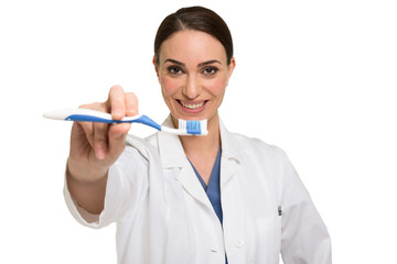 Dentist showing a toothbrush
