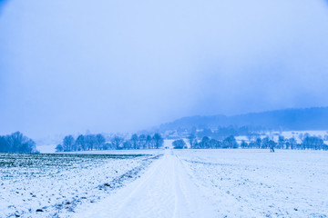Winter road to rural village
