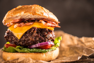 Close-up home made beef burger on wooden table