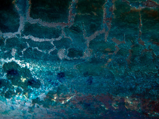 multi-colored paint on uneven surface