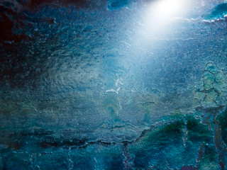 multi-colored paint on uneven surface