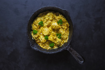 Delicious and spicy chicken curry roast from Indian cuisine.