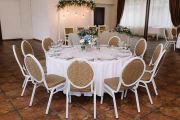 Festive lunch at restaurant. A wedding table for guests.