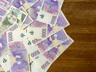 Czech money on wooden table
