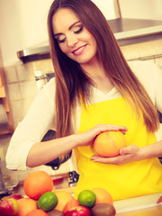 Beautiful lady in kitchen.