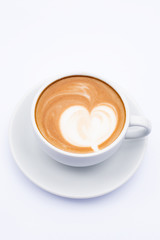 Coffee latte in a white mug on a white background.