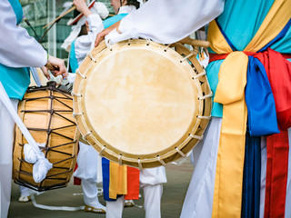 Blured picture of Musicians play on a Korean traditional percussion musical instrument Janggu....