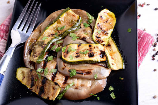 Eggplant and grilled and flavored sliced courgette 