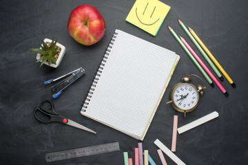 School board with handles, chalk, alarm clock on the school board. With space for writing or...