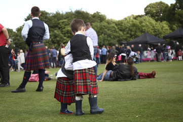 Two boys in kilts at the festival