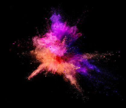 Explosion of coloured powder isolated on white background © Jag_cz