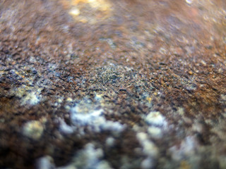 multi-colored paint on uneven surface