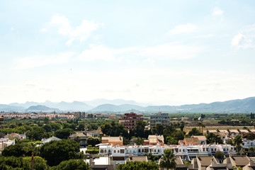 View of a mediterranean resort with mountains in the background