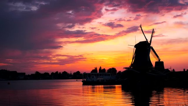 Windmills at Zaanse Schans in Holland on sunset. Zaandam, Nether