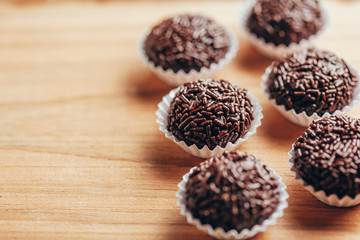 Brigadeiro is a typical homemade chocolate truffle from Brazil. Cocoa, condensed milk and sprinkles of chocolate. Common in children birthday party.