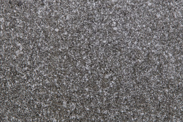Gray black white rough natural granite stone texture background