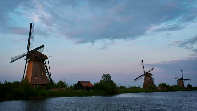 Windmills at Kinderdijk in Holland on sunset. Netherlands