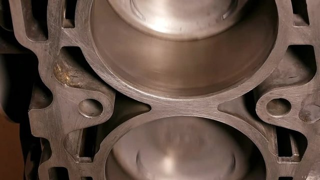 Car boxer opposite gas engine motor in motion. Vertical format video.