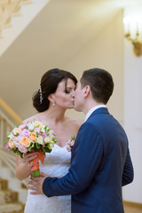 Beautiful wedding colorful bouquet and dress for bride