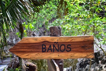 Banos, Bathroom Sign on the trail in El Eden by Puerto Vallarta Mexico where movies have been filmed.