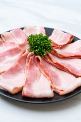 sliced raw pork bacon