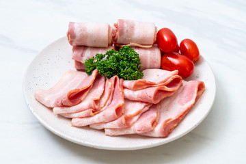 sliced raw pork bacon