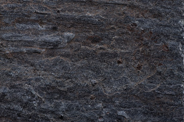 Dark stones texture pattern nature background.