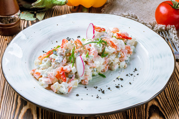 Olivier salad with crab meat © bbivirys