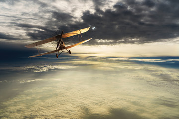 Fototapeta na wymiar Old airplane on the blue sky