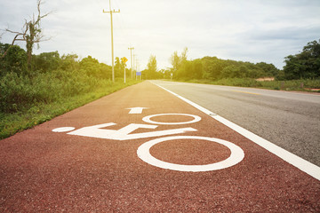 Bicycle sign on the asphalt road.