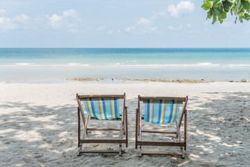 Colorful wooden beach chairs
