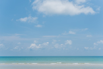 Fototapeta na wymiar Beach with white sand and blue skies